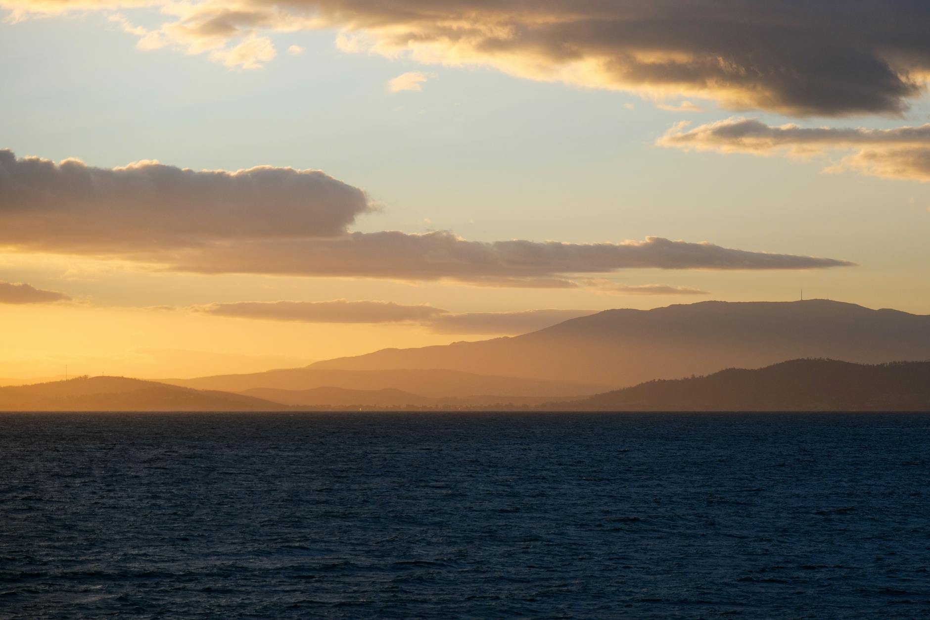 Stunning landscape photography with golden hour lighting and atmospheric color toning
